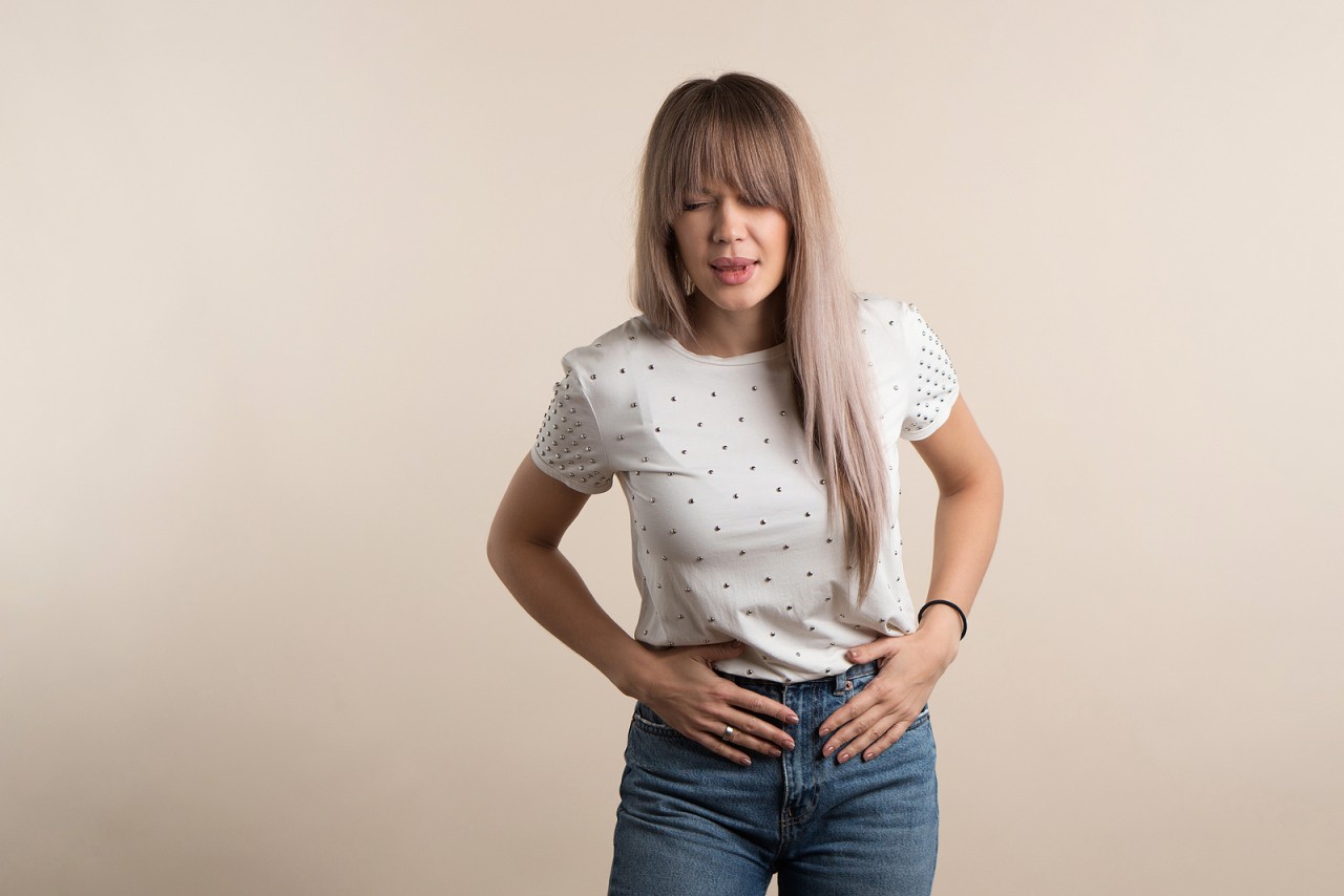 bigstock-Upset-Young-Woman-Keeps-Hands--445053203-1